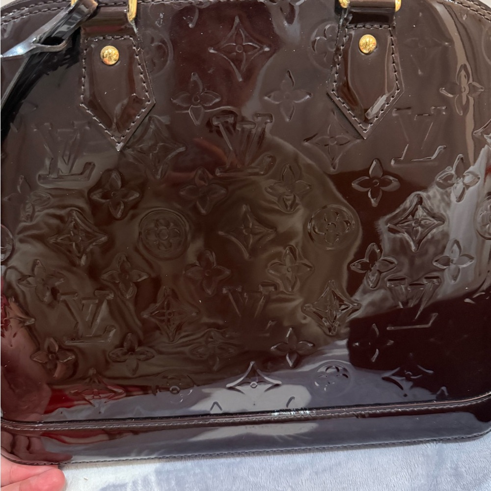 Louis Vuitton Glossy Monogram Alma Satchel in Dark Bordeaux - Picture 14 of 16